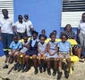 Students of the St. Bartholomew Primary School, enjoying the donated Bench. | Barbados National Energy Company Ltd.