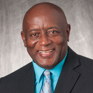 team member Dr. Asquith Thompson